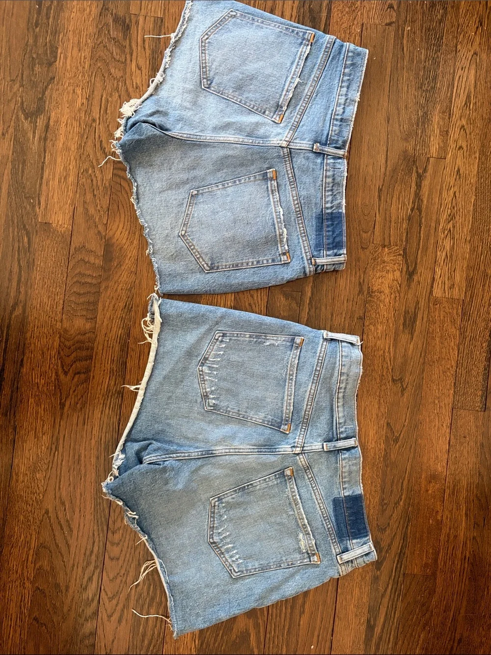 Distressed Light Blue Denim Shorts - Women's